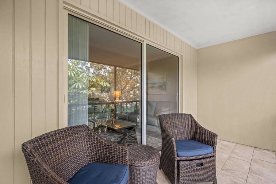 Screened in lanai accessible from living room & primary bdrm